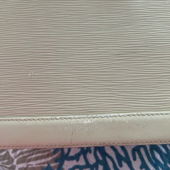 Authentic Louis Vuitton Ivory Epi Alma Textured Leather Bag - Picture 6 of 15